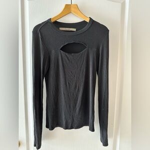 Gorgeous black peekaboo top from Enza Costa